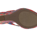 Colorful wedge sandal with a vibrant paint inspired floral pattern bottom