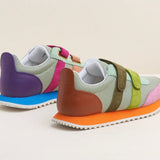 Multicolored velcro sneaker with orange sole heel view
