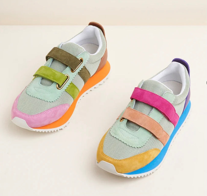 Multicolored velcro sneaker with orange sole pair front view