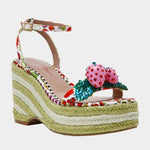 Colorful raffi green striped wedge sandal with with fruit strap and strawberry embellishment from side