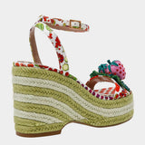 Colorful raffi green striped wedge sandal with with fruit strap and strawberry embellishment from back side