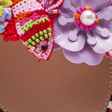 close up of floral applique
