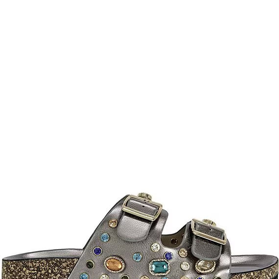Silver sandal with gemstone embellishments on a white background