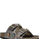 Decorative sandal with embellishments on a white background