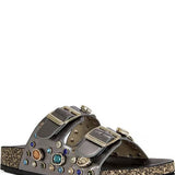 Decorative sandal with embellishments on a white background