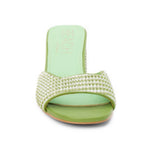 Green woven sandal with a block heel front