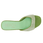 Green woven sandal with a block heel top