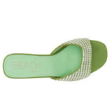 Green woven sandal with a block heel top