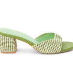Green woven sandal with a block heel close-up