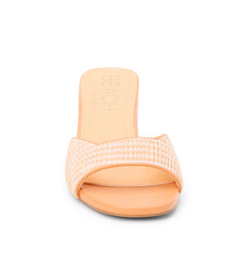 Orange woven sandal with a block heel front