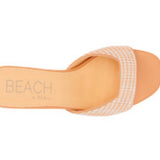 Orange woven sandal with a block heel top