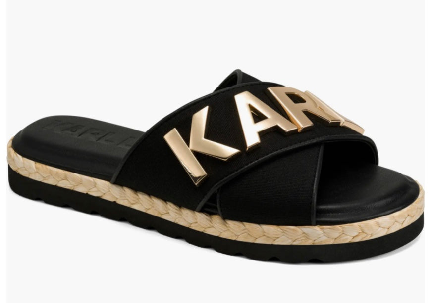 Black slide sandal with gold logo and woven strap side