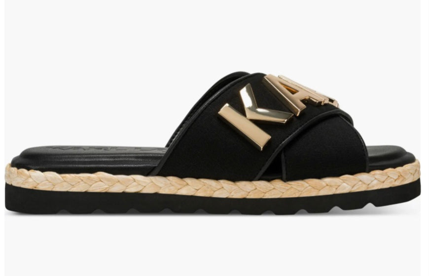 Black slide sandal with gold logo and woven strap close-up