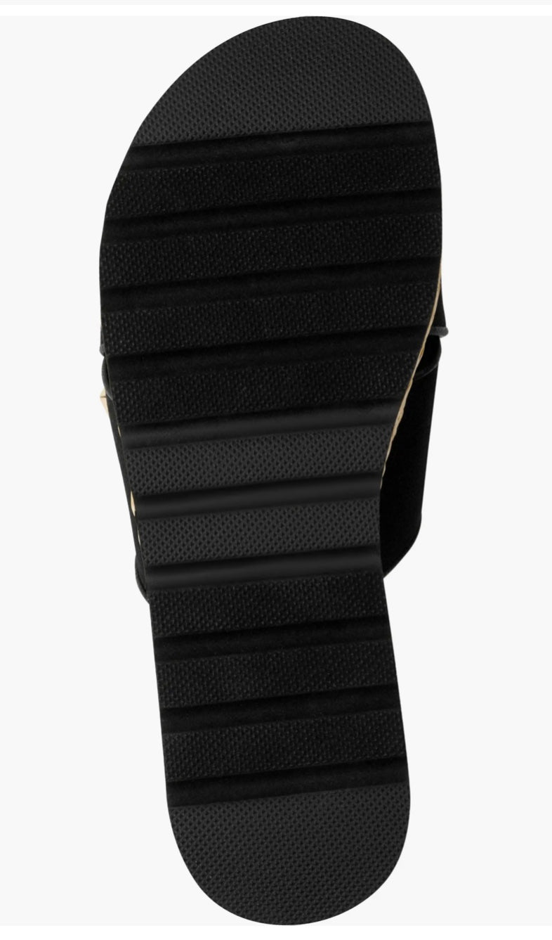 Black slide sandal with gold logo and woven strap sole