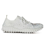 White sneaker with rhinestone embellishments close-up