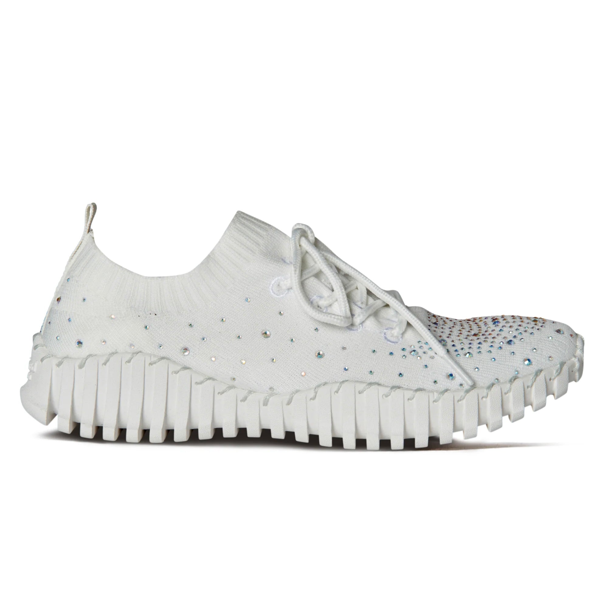 White sneaker with rhinestone embellishments close-up