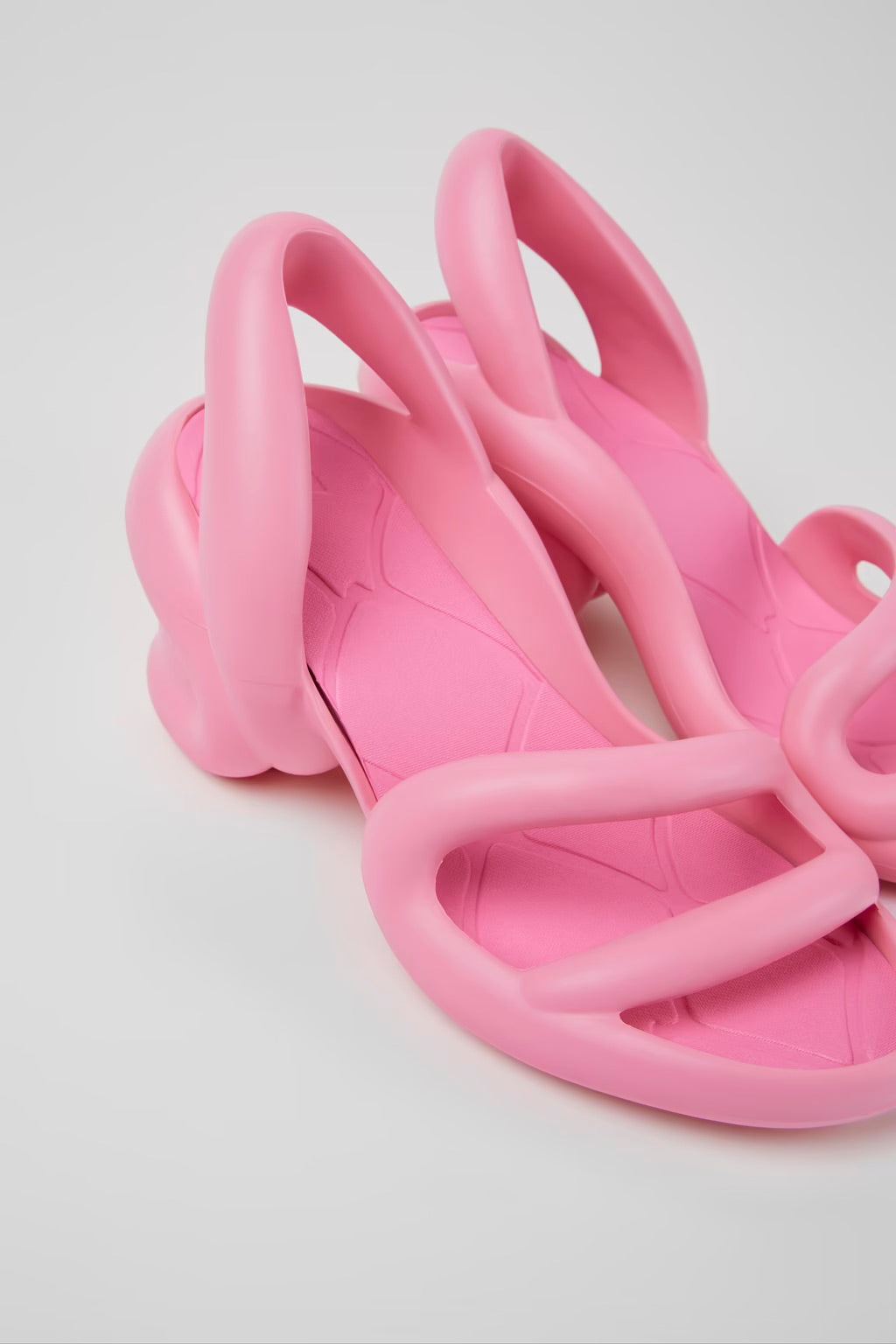 Pink high-heeled shoe pair
