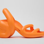 Orange high-heeled shoe close-up