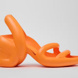 Orange high-heeled shoe close-up