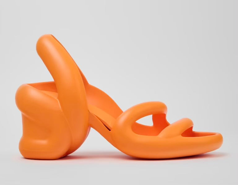 Orange high-heeled shoe close-up