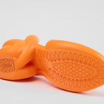 Orange high-heeled shoe sole