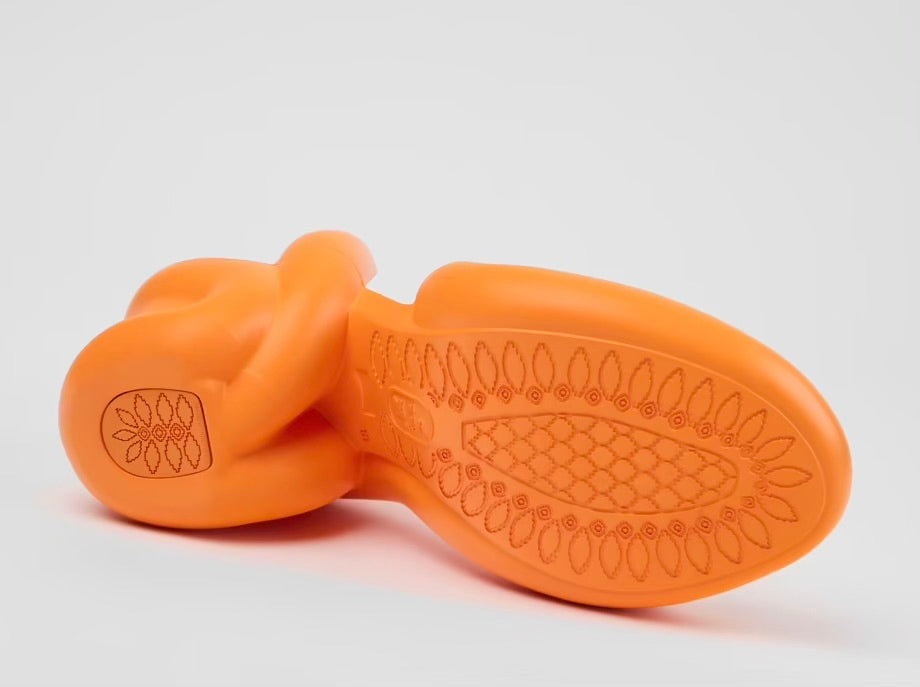 Orange high-heeled shoe sole