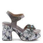 High-heeled sandal with floral pattern and decorative flower close-up