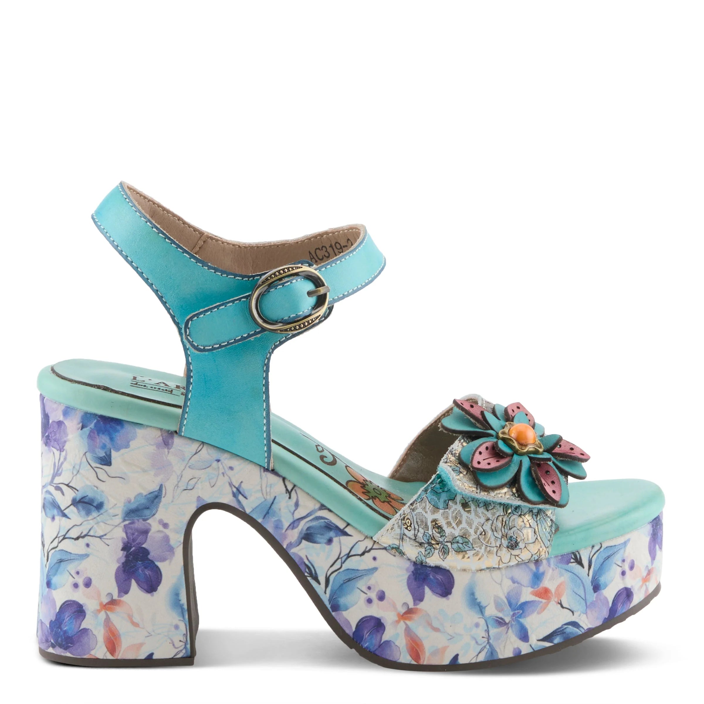 Colorful turquoise high-heeled shoe with floral pattern close-up