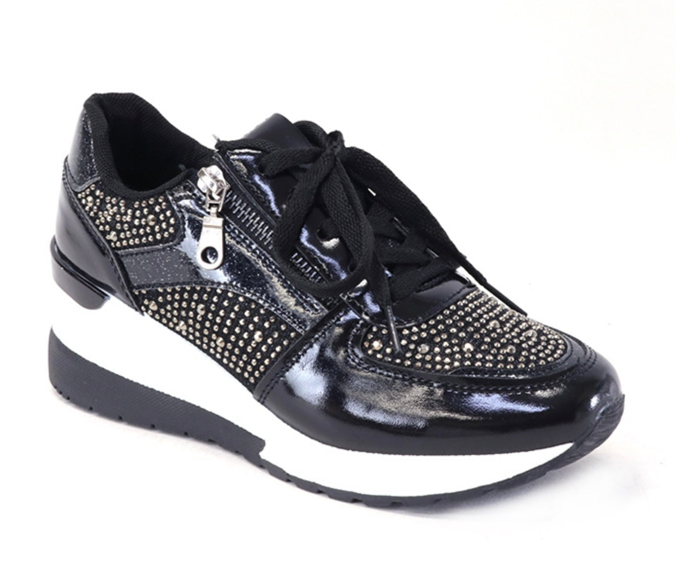 Black sneaker with rhinestone details on a white background