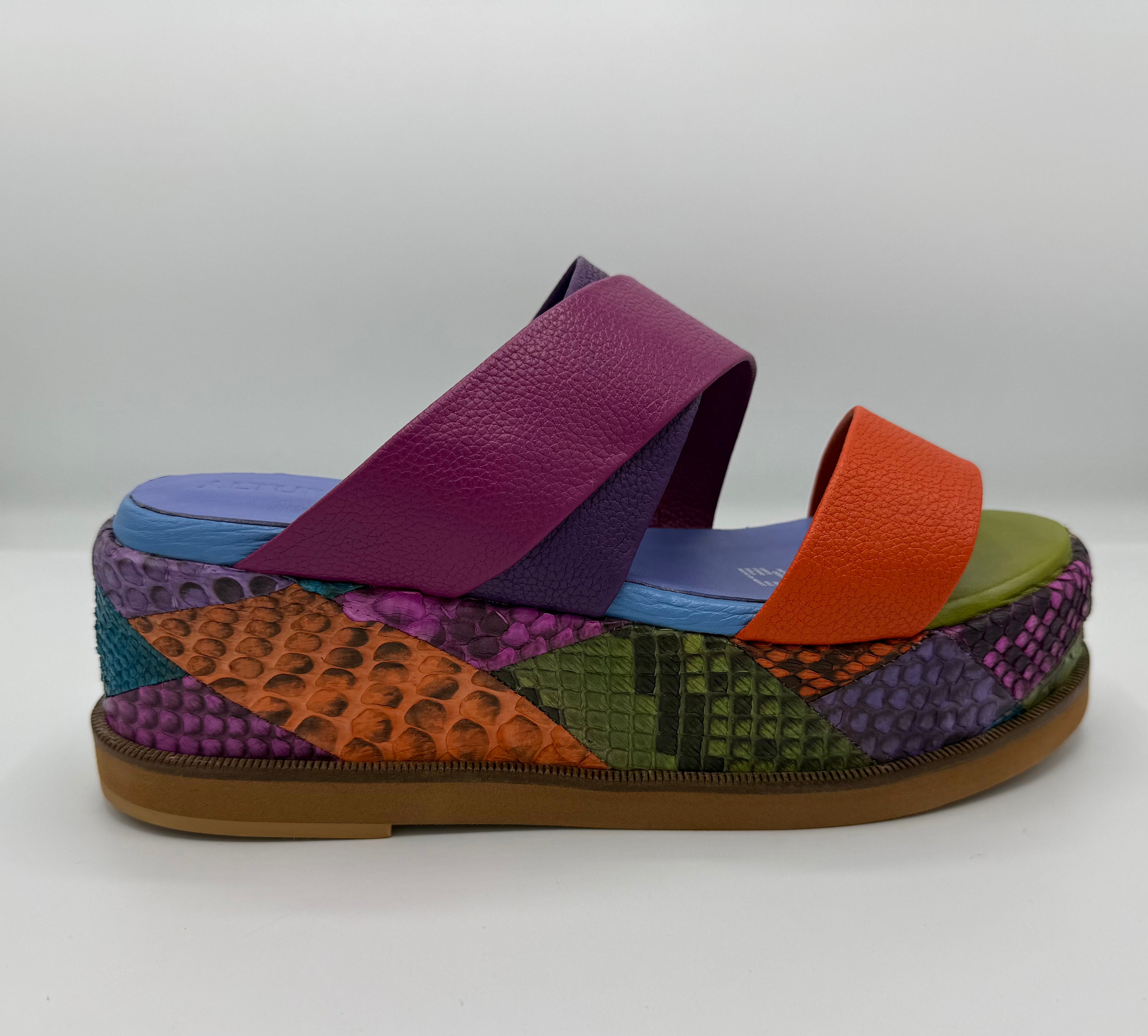 Multicolored sandal with patterned snake skin sole close-up