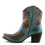 Blue cowboy boot with floral patterns on a white background showing side zipper