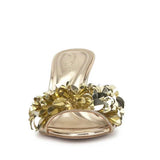 Gold high-heeled shoe with gold sequin embellishments toe box