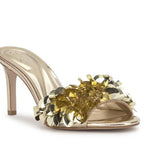 Gold high-heeled shoe with gold sequin embellishments front view