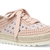 Pink woven sneaker with textured sole front view