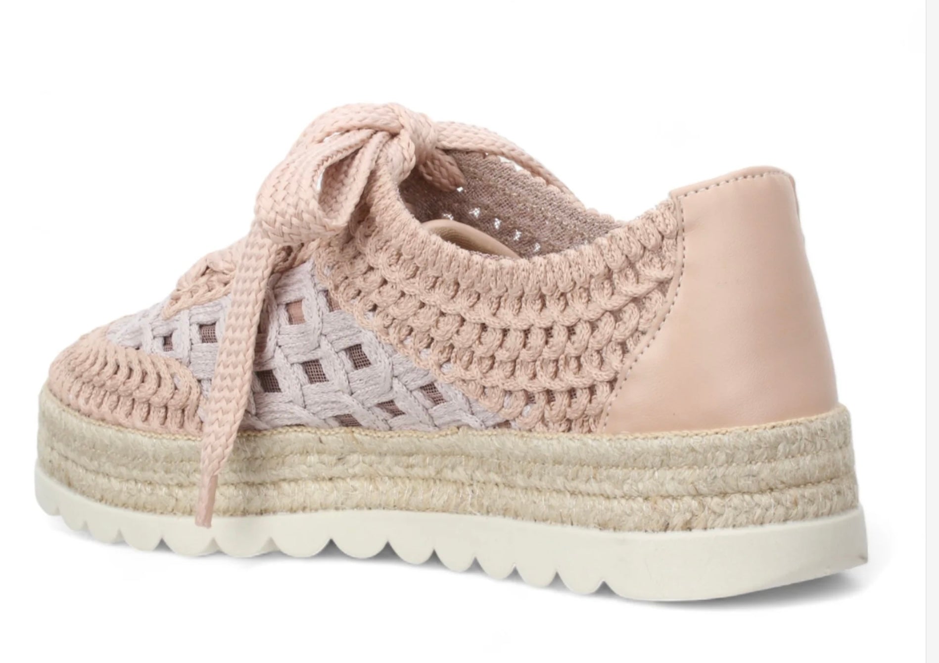 Pink woven sneaker with textured sole heel view