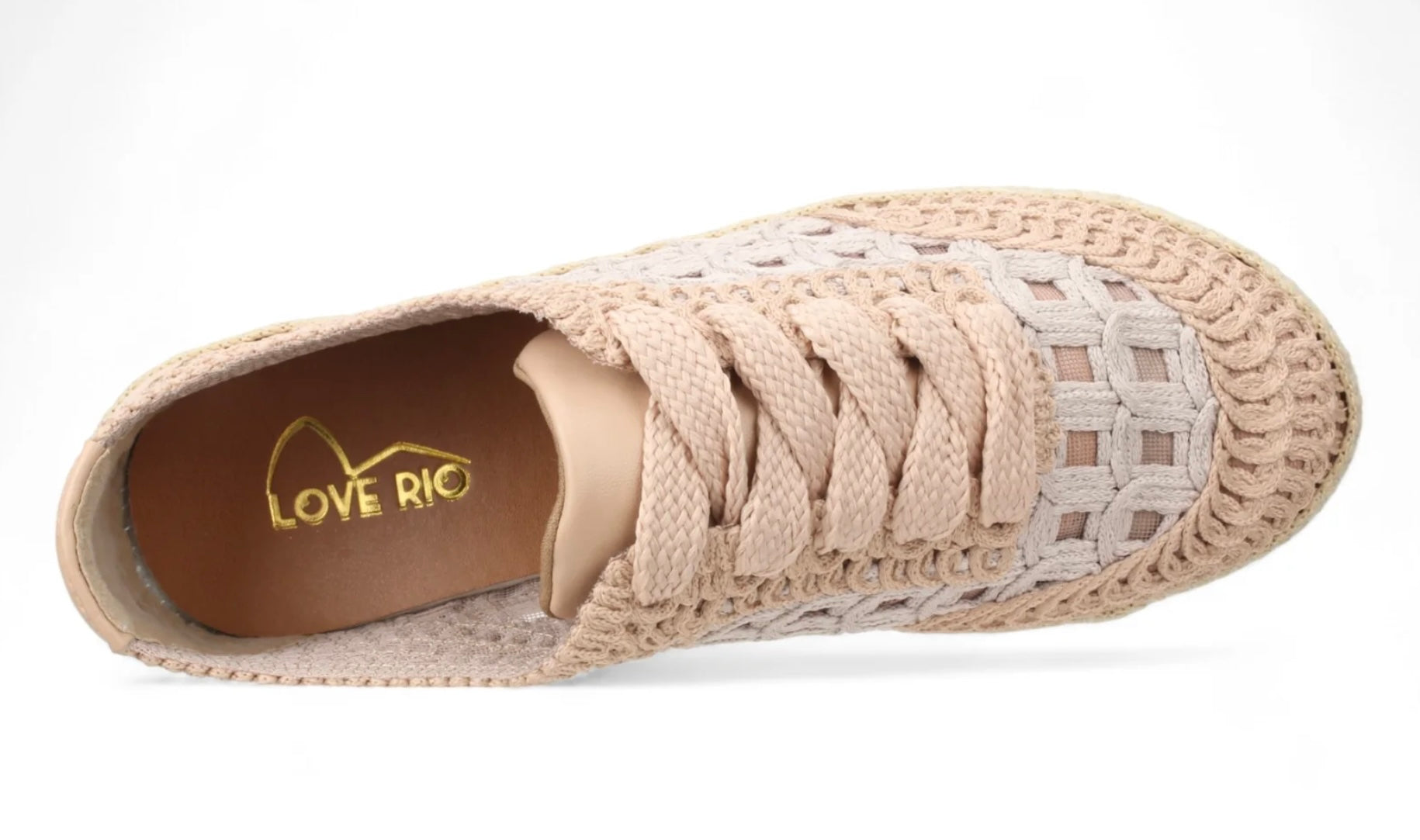 Pink woven sneaker with textured sole top view