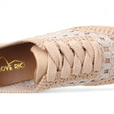 Pink woven sneaker with textured sole top view