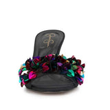Black high-heeled shoe with colorful floral sequin embellishments toe box