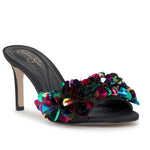 Black high-heeled shoe with colorful floral sequin embellishments front view