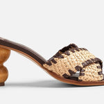 Brown and tan woven sandal with wooden bubble heel close up