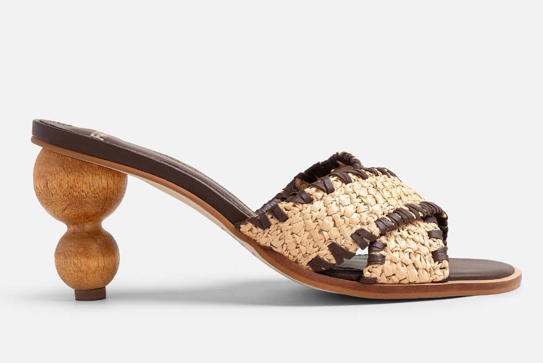 Brown and tan woven sandal with wooden bubble heel close up
