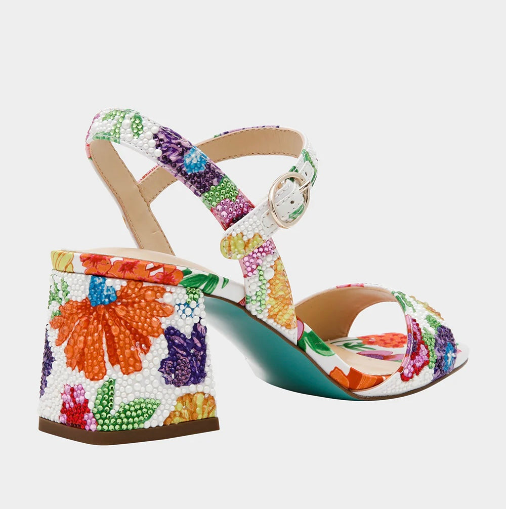Colorful floral-patterned heel with buckle closure heel view