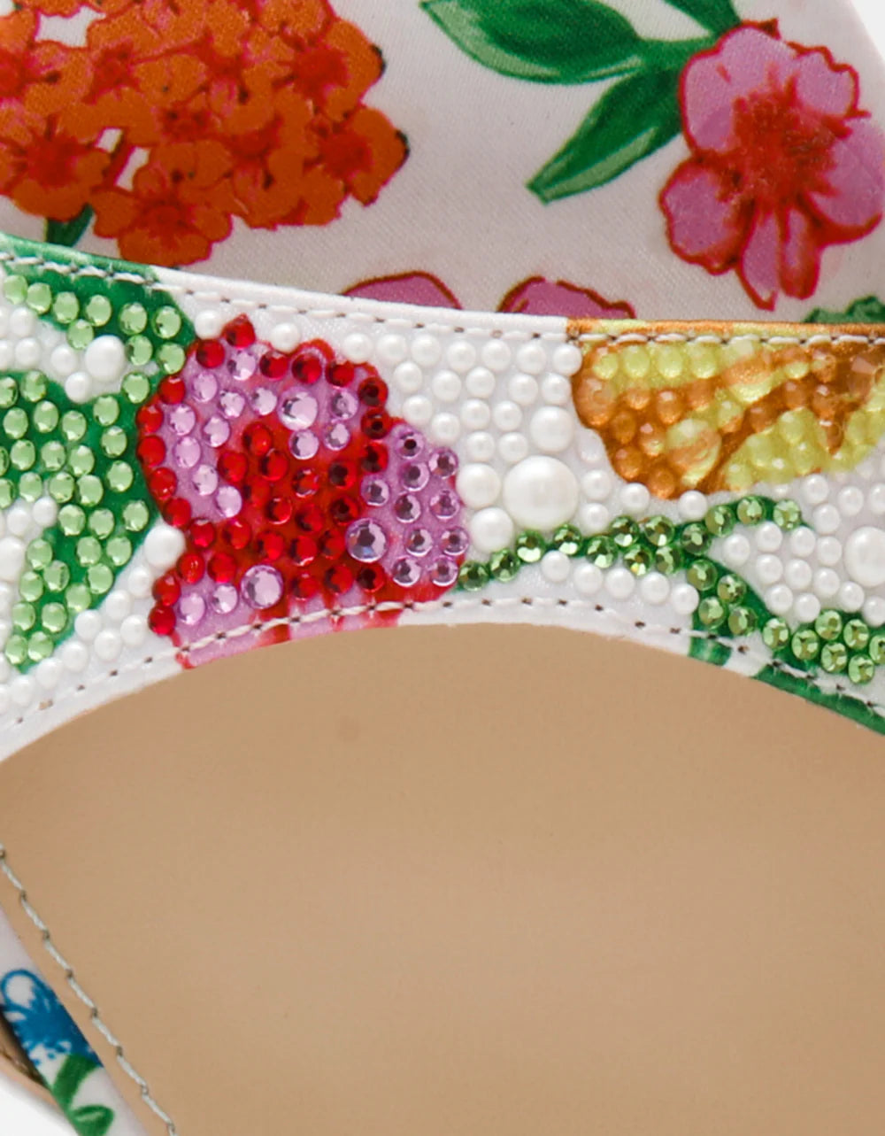 Colorful floral-patterned heel with buckle closure close-up