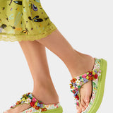 Colorful floral sandal with a green sole model