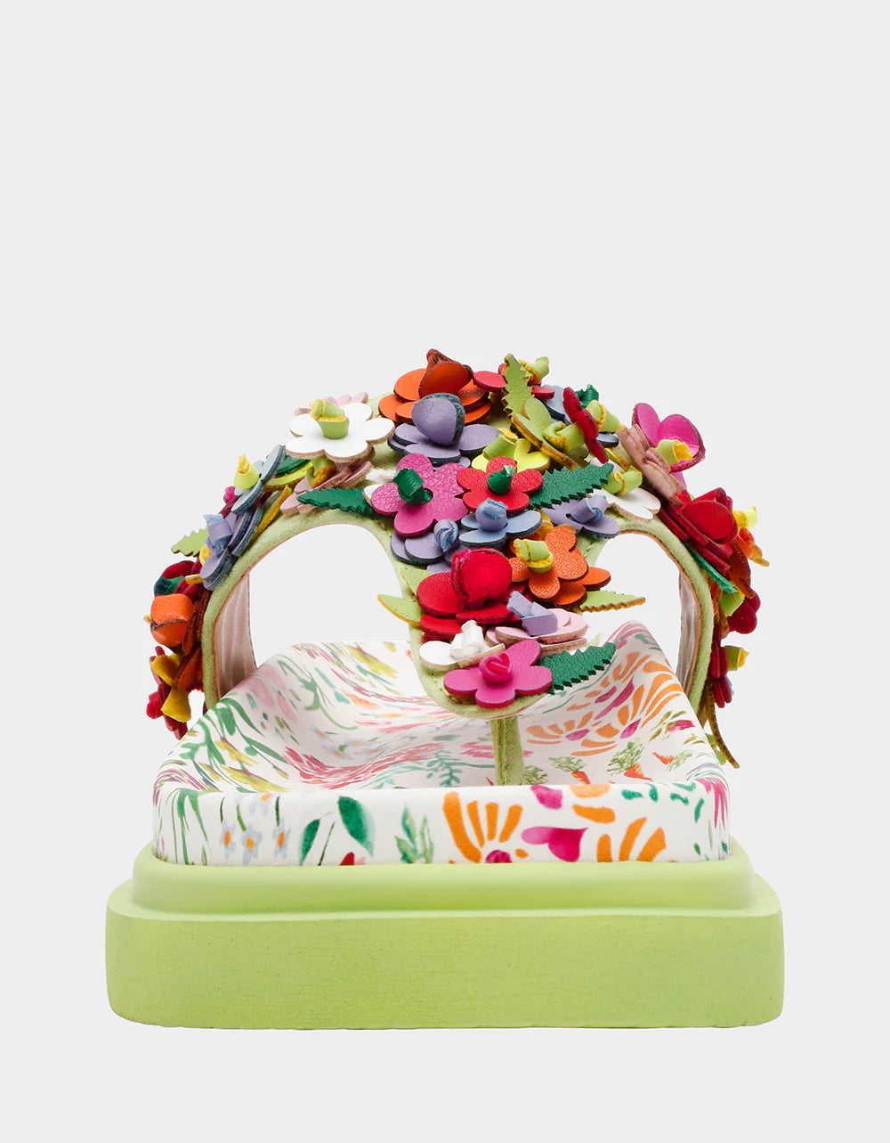 Colorful floral sandal with a green sole toe box