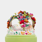 Colorful floral sandal with a green sole toe box