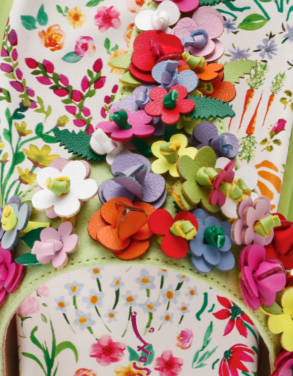 Colorful floral sandal with a green sole design