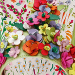 Colorful floral sandal with a green sole design