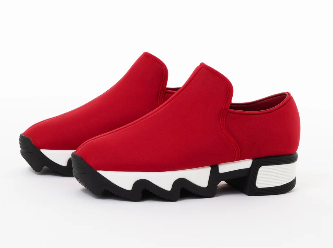 Red slip-on shoe with black & white sole pair
