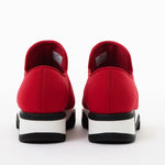 Red slip-on shoe with black & white sole heel view